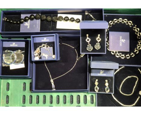 Collection of Swarovski Crystal boxed Jewellery; Necklaces, earrings and bracelet.