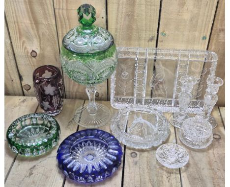 Crate of crystal and Bohemian glass ware; Bohemian single overlay and facet cut lidded preserve, ashtrays and vase. Together 