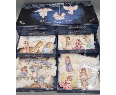 Collection of Dona Gelsinger Heavens little angels Ornaments with display box with eight drawers