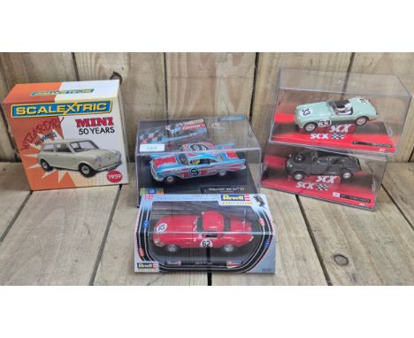 Five various Scalextrics boxed models; Chevrolet Bel Air 57, Jaguar E-Type, Citreon 2 CV, MG A and 1959 Mini.