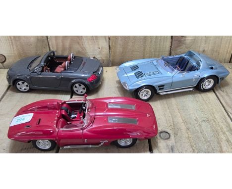 Three various large die cast car models; Maisto Audi TT Roadster, Autoart Chevrolet Corvette Stingray 1959 &amp; Road Signatu