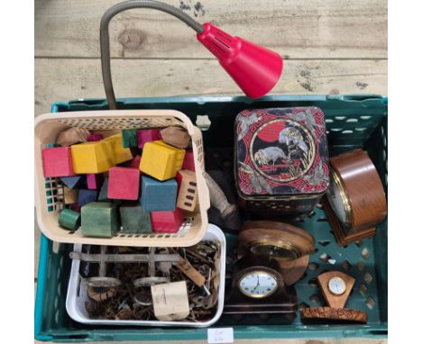 Crate of collectables; various miniature and mantel clocks. Cast Iron flat irons, Angle poise table lamp, Tub of keys and bui