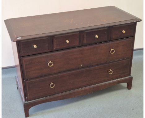 Three pieces of Stag Furniture and bedroom chair. 71x104x47cm chest of drawers, 71x152 x47cm Dressing table, 72x46x47cm bedsi