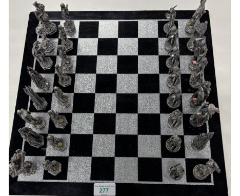 Lord of the Rings Chess board with chess pieces. 