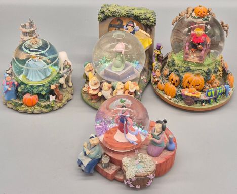 Collection of Four Walt Disney snow Globes; Winnie the Pooh, Snow white and the seven dwarves, Cinderella and Mulan.