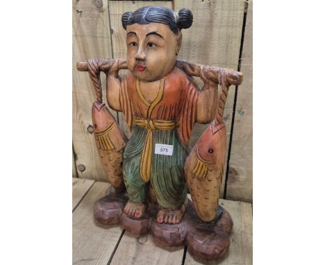 Large hand carved wooden Asian figure sculpture carrying fish. 50 cm in height 