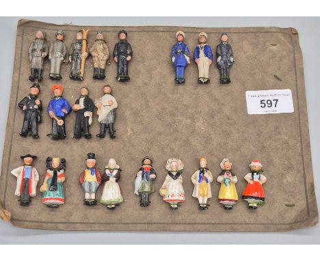 Selection of carded German 1930-1950's porcelain figure badges. 