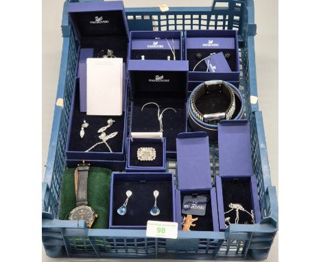 Collection of Swarovski Crystal jewellery; Brooches, earrings, watches and other items.