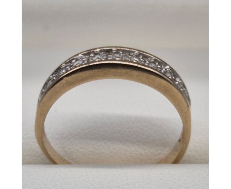 9ct yellow gold and diamond stone ring. 0.10cts diamonds. 2.08grams. Ring size R. 