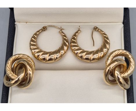 Two pairs of 9ct yellow gold earrings. 6grams 