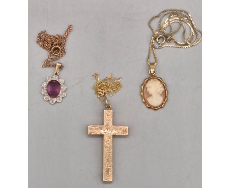 Three items of jewellery; Gilt metal cross with 9ct gold chain. 9ct yellow gold and carved cameo pendant with costume chain. 