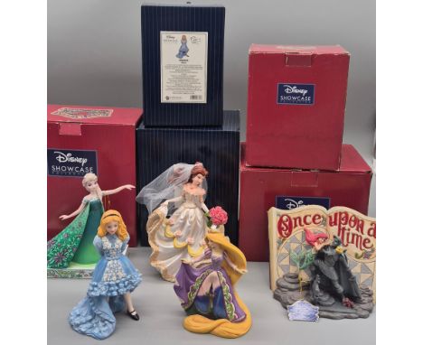 Collection of Disney Showcase Figurines; Rapunzel Daring heights, Alice, Elsa, Belle and the little mermaid with boxes.