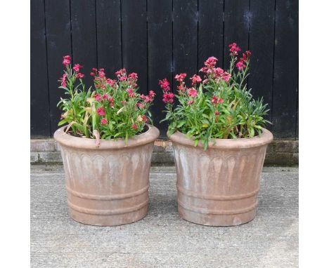A pair of large terracotta garden pots (2)52w x 43h cmCondition report: Each measures 40cm diameter across the inside edge. T