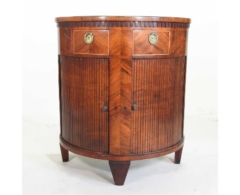 A 19th century mahogany half round commode, enclosed by a tambour front, of tapered feet77w x 40d x 85h cm