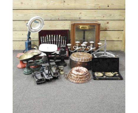 A collection of scales, 48 cm high, together with a wooden artist's easel, 152 cm, a canteen of cutlery, a pair of plated can