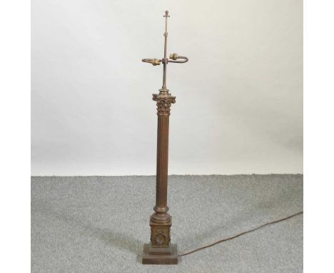 A large 19th century brass table lamp, in the form of a Corinthian column. Provenance: Christie's, Notting Hill, Not an Ordin