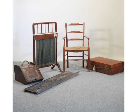 An Edwardian mahogany fire screen, 100 cm high, together with a 19th century rush seated ladder back armchair, a coal purdoni
