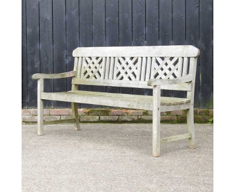 A hardwood slatted garden bench152w x 57d x 87h cmCondition report: Overall is usable and solid, but heavily weathered. One a