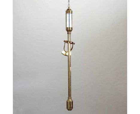 A brass cased marine stick barometer, 20th century, the silverered dial signed Russel, London, on a gimble support94cm high