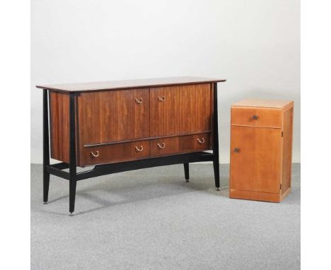 A 1950's G Plan Librenza sideboard, by E Gomme, containing a pair of doors over two short drawers, together with a light oak 