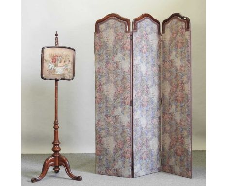 A Victorian mahogany tapestry pole screen, on a tripod base, 148cm high, together with a modern Victorian style tapestry dres