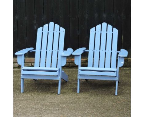 A pair of folding wooden slatted adirondack garden chairs, painted blue (2)Condition report: These are both complete and usab