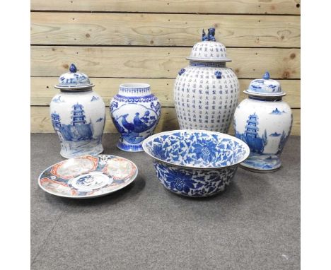 A modern Chinese blue and white glazed pottery ginger jar and cover, together with a pair smaller and other modern Chinese ce