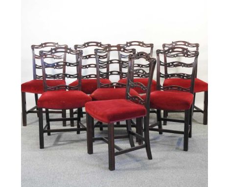 A set of eight 19th century mahogany ladder back dining chairs, with red upholstered seats