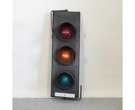 A traffic light125cm high