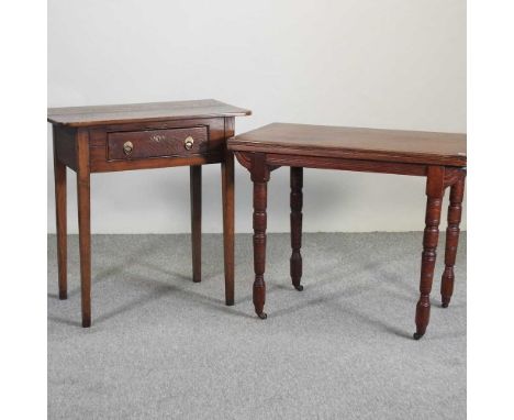 An Edwardian walnut folding card table, on ring turned legs, together with an 18th century and later oak side table, containi