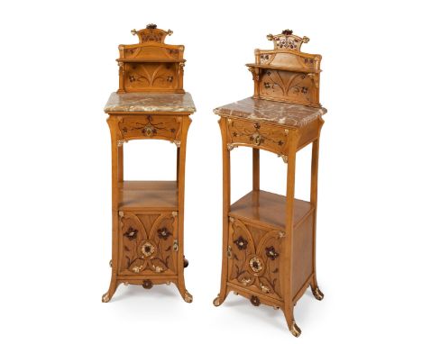 JOAN BUSQUETS I JANÉ (Barcelona, 1874 - 1949).Pair of modernist bedside tables, ca. 1900.Light walnut wood with carved and gi