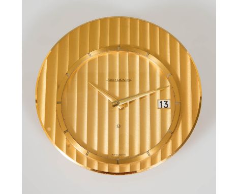 Jaeger- LeCoultre table clock: 20th century.Gilt metal.In running condition.Measurements: 13 x 4.5 cm.Clock made of gilt meta