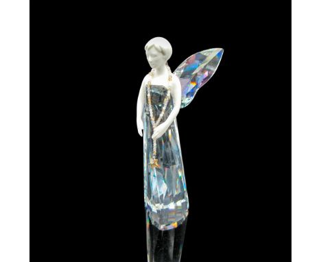 Figural has clear faceted body adorned with crystal wings and crystal necklace with star. Head, upper torse and arms are whit