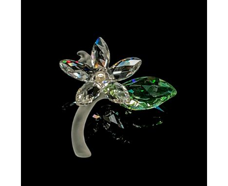 Beautiful clear cut crystal flower with pearl center and green leaf on frosted stem. This item has its original box: 4"L x 4"