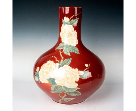Limited edition vessel in glaze finish, decorated with large white roses on a maroon colored ground. Lladro backstamp. Certif