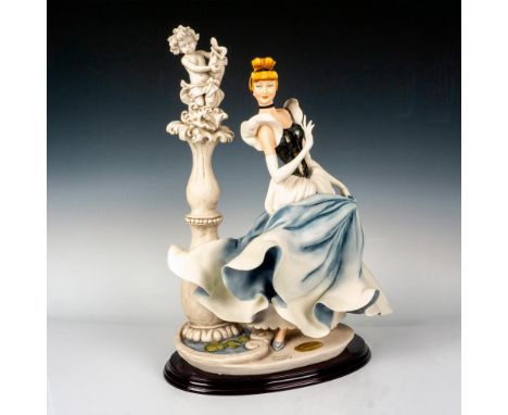 This is a timeless beautiful limited edition Disney statue of Cinderella at the Fountain statue by Giuseppe Armani. She is re