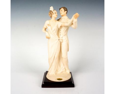 This figurine features a handsome couple dancing on a square wooden base. Figurine number 1303F. Giuseppe Armani golden plate