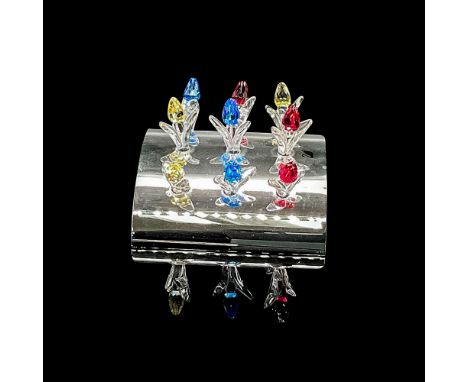 Metal arched base holds 9 red, blue and yellow flowers. Swarovski backstamp. This item has its original box: 3.25"L x 3.25"W 