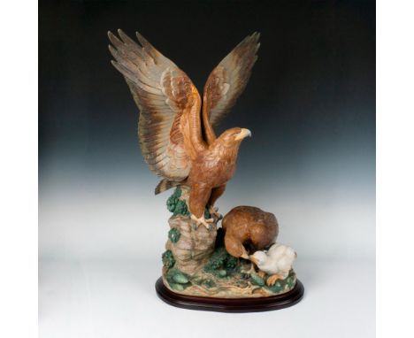 Elite limited edition, gres finish monumental sculpture depicting a male eagle with outstretched wings while the mother eagle