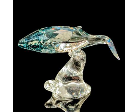 This young whale gleams in Shadow crystal with Crystal Moonlight fins. Swarovski acid mark on base. Item has original box mea