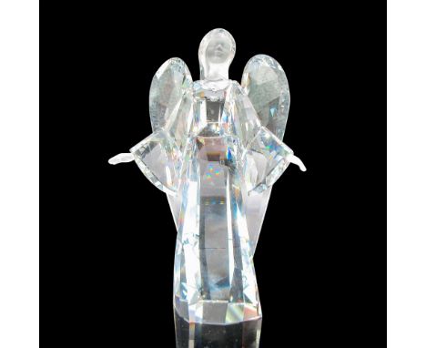 Beautiful, clear faceted body has frosted face and hands. Swarovski backstamp. This item has its original box: 7"L x 7"W x 4.