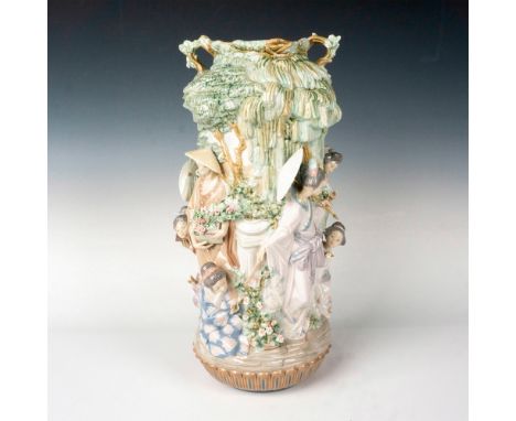 A stunning glossy tall vase adorned with Japanese figures in a garden. Lladro backstamp. Artist: Salvador DebonIssued: c. 198