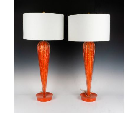 2 remarkable Venetian glass table lamps attached to round wooden bases. Slender ribbed glass columns, spectacularly decorated