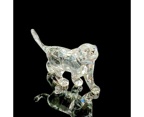 This baby lion shines in clear crystal with a Jet crystal nose and eyes. Item comes with box measuring 3.25"L x 4.5"H. Artist