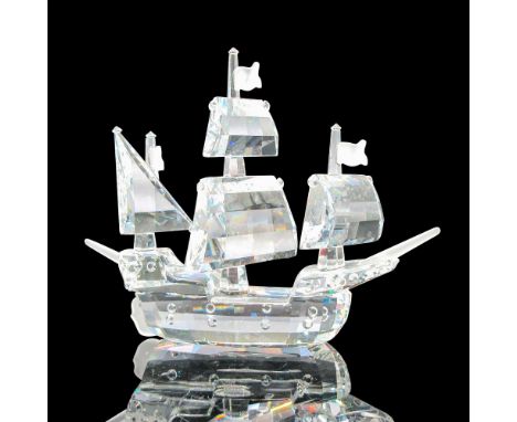 Part of the When We Were Young series. Clear faceted ship and sails. Flags, bow and stern are frosted crystal. Swarovski back