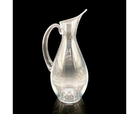 A classic Baccarat Crystal Pitcher, embodying timeless elegance and craftsmanship. Baccarat backstamp. Issued: 20th CenturyDi