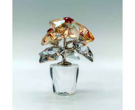 A figure depicting a pot of flowers that have the flowers in the shape of stars with some being clear and the others being am