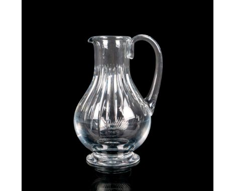 Clear crystal pitcher with applied handle, decorated in the Massena pattern with vertical cuts all around the perimeter. Hold