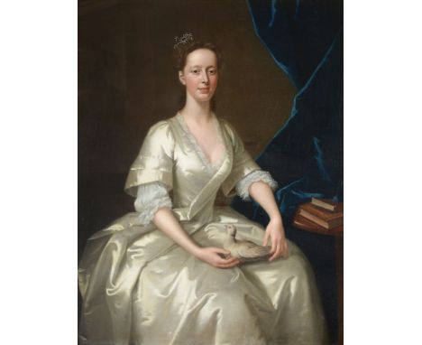Attributed to Thomas Bradwell (British 1704-1767) Portrait of a lady, seated in white with a dove   Oil on canvas, in a carve