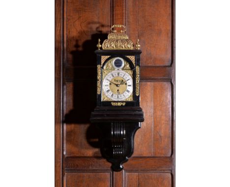 A Queen Anne/George I gilt brass mounted ebony quarter chiming table clock, Markwick, London, circa 1715, the substantial sev